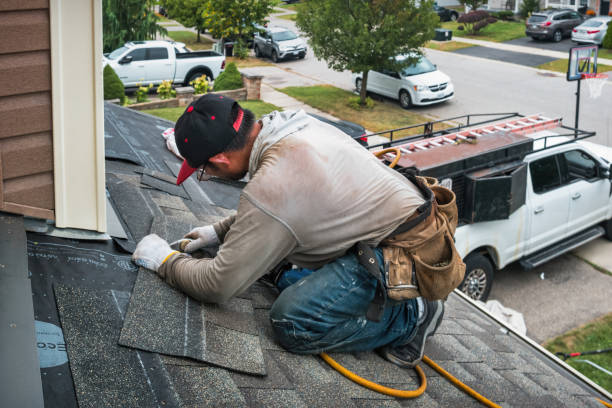 Professional Gutter Repair And Installation technician working in Summitville, IN